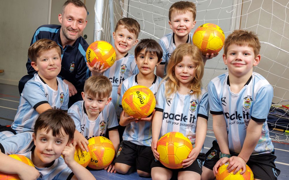Cogan sports side | welcome donation | WWU | Wales & West Utilities
